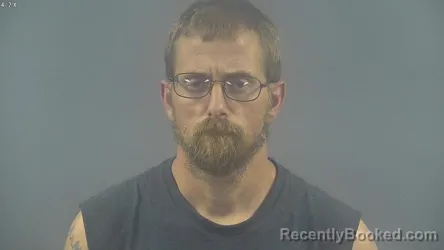 Mugshot of DANIEL FRANCIS THOMAS booked in Warren County, Kentucky on May 19, 2026
