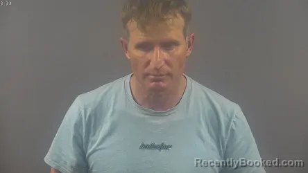 Mugshot of ERNEST JASON JOHNSON booked in Warren County, Kentucky on May 16, 2026