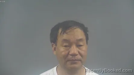 Mugshot of HRANG HNUN booked in Warren County, Kentucky on March 29, 2026