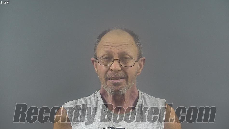 Booking photo from Warren County, Kentucky