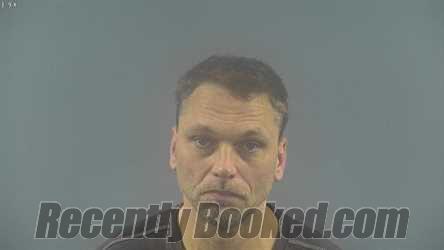 Booking photo from Warren County, Kentucky