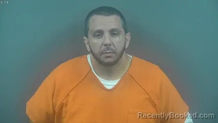Mugshot of Joshua Tyler Escue booked in Warren County, Kentucky on August 15, 2026