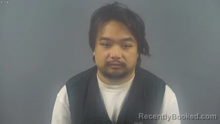 Booking photo from Warren County, Kentucky