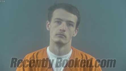 Booking photo from Warren County, Kentucky