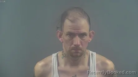 Mugshot of JUSTIN WILLIAM HEIL booked in Warren County, Kentucky on March 21, 2026