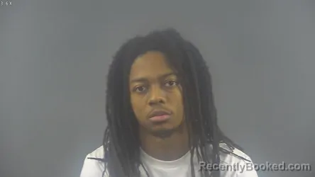 Mugshot of JAYDEN DWAYNE JOHNSON booked in Warren County, Kentucky on June 14, 2026
