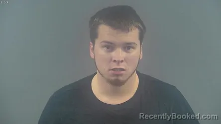 Mugshot of JASON HAYDEN LOGSDON booked in Warren County, Kentucky on March 12, 2026