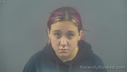 Mugshot of JAYDA RENEE RUSSIAN-COONS booked in Warren County, Kentucky on March 19, 2026