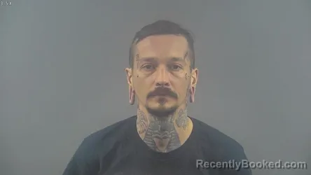 Mugshot of JONATHAN MICHEAL REESE booked in Warren County, Kentucky on March 13, 2026