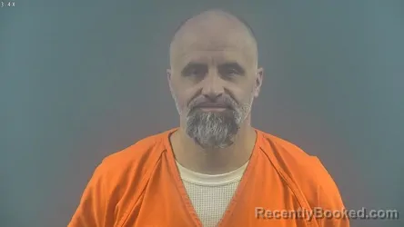 Booking photo from Warren County, Kentucky