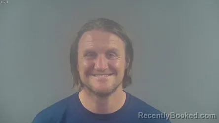 Mugshot of JUSTIN DANIEL TRIPLETT booked in Warren County, Kentucky on March 21, 2026