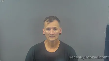 Mugshot of Justin Morris Warren booked in Warren County, Kentucky on September 4, 2026