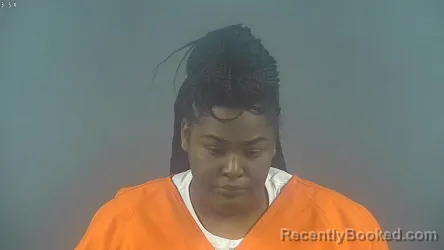 Mugshot of KAYLA KIEYANNA BURTON booked in Warren County, Kentucky on March 14, 2026