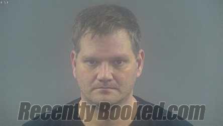Booking photo from Warren County, Kentucky