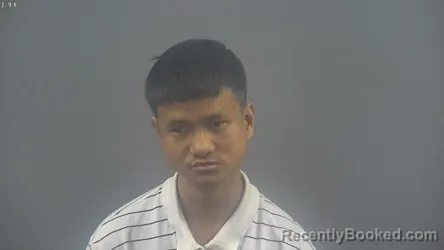 Mugshot of LIAN CIN PAU booked in Warren County, Kentucky on March 5, 2026