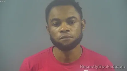 Mugshot of LUSUMBO RAMADHANI booked in Warren County, Kentucky on March 27, 2026