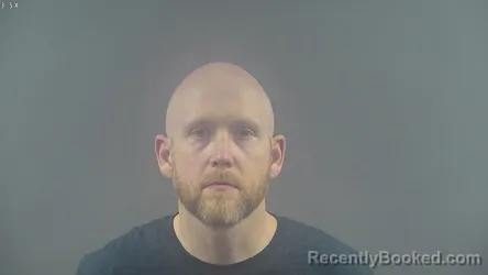 Mugshot of MICHAEL ADAM BURKE booked in Warren County, Kentucky on March 12, 2026