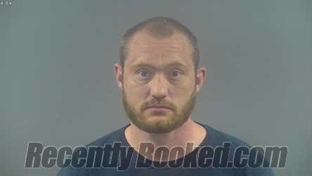 Booking photo from Warren County, Kentucky