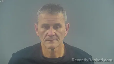 Booking photo from Warren County, Kentucky