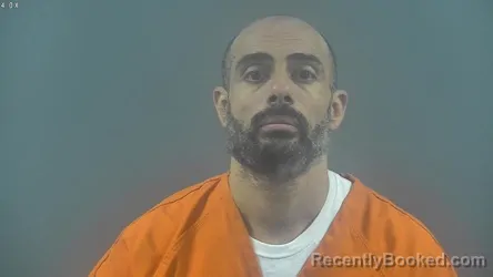 Mugshot of MINA K KHALIL booked in Warren County, Kentucky on June 2, 2026