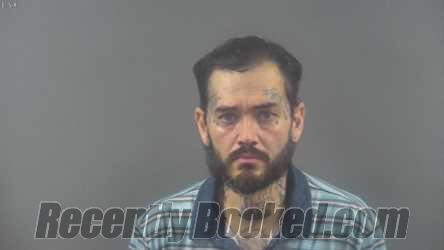 Booking photo from Warren County, Kentucky