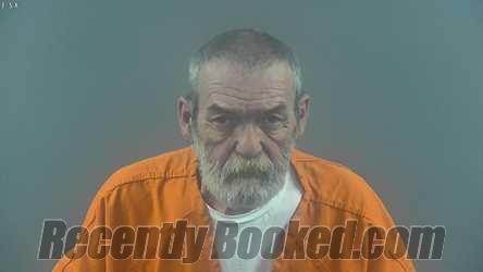 Booking photo from Warren County, Kentucky