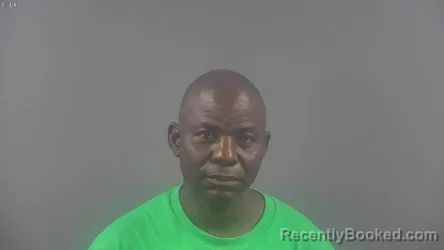 Mugshot of RAJABU ULUMWENE KAMILI ASENDE booked in Warren County, Kentucky on May 20, 2026