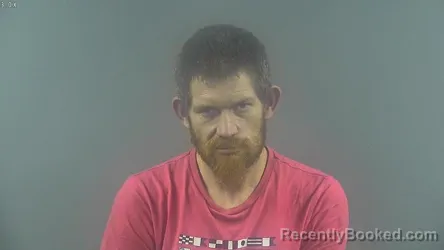 Booking photo from Warren County, Kentucky