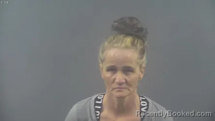 Mugshot of RITA KAY MILLER booked in Warren County, Kentucky on March 14, 2026