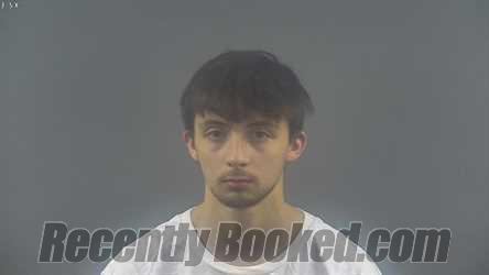 Booking photo from Warren County, Kentucky
