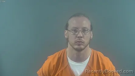Booking photo from Warren County, Kentucky