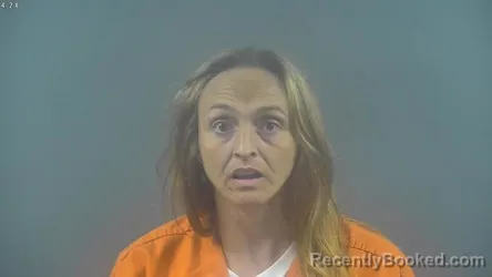 Mugshot of SHARON ELIZABETH ADAMSON booked in Warren County, Kentucky on June 19, 2026
