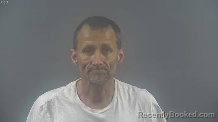 Mugshot of SAMUEL DEREK ADKINS booked in Warren County, Kentucky on April 15, 2026