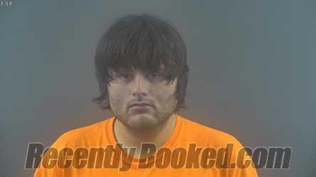 Booking photo from Warren County, Kentucky