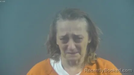 Mugshot of SCARLETT YVONNE GRIMES booked in Warren County, Kentucky on March 27, 2026