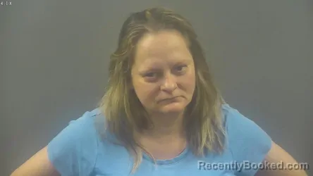 Mugshot of Sarah Suzanne Wells booked in Warren County, Kentucky on August 10, 2026