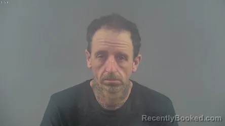 Mugshot of TODD ALLEN DOOLEY booked in Warren County, Kentucky on March 12, 2026