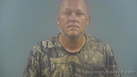 Mugshot of TRAVIS EDWARD DEWEESE booked in Warren County, Kentucky on July 27, 2026