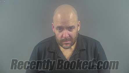 Booking photo from Warren County, Kentucky