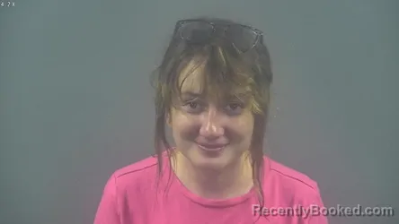 Mugshot of TATUM ELLEN SAGE booked in Warren County, Kentucky on May 19, 2026