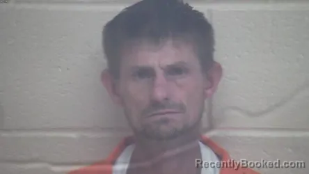 Mugshot of Christopher Allan Holmes booked in Webster County, Kentucky on October 7, 2026