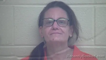 Mugshot of KELLY JOANNA NESMITH booked in Webster County, Kentucky on April 27, 2026