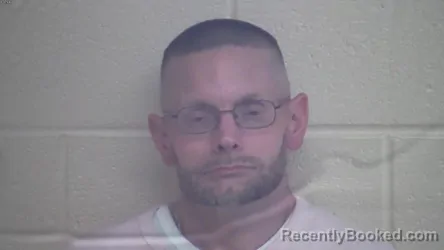 Mugshot of RYAN DAVID NEWCOM booked in Webster County, Kentucky on March 31, 2026