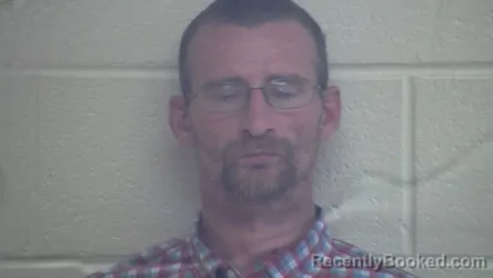 Mugshot of TRAVIS LEE GIBSON booked in Webster County, Kentucky on May 7, 2026