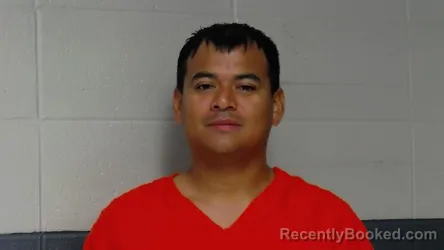 Mugshot of CARLOS ESCOBAR booked in Woodford County, Kentucky on June 14, 2026