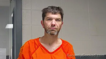 Mugshot of TRAVIS SCOTT HELTON