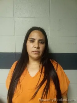 Mugshot of YASENIS MARILI AGUILAR-MONTOYA booked in Woodford County, Kentucky on July 13, 2026