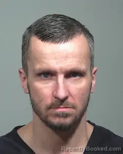 Mugshot of Dustin Alan Hodgdon booked in Cumberland County, Maine on April 22, 2026