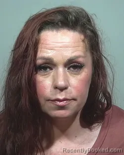 Mugshot of Jessica Ruth Wozny booked in Cumberland County, Maine on May 13, 2026