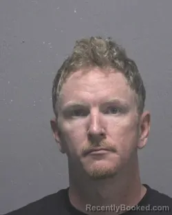 Mugshot of Joshua Jacob Mathews booked in New Hanover County, North Carolina on August 6, 2026